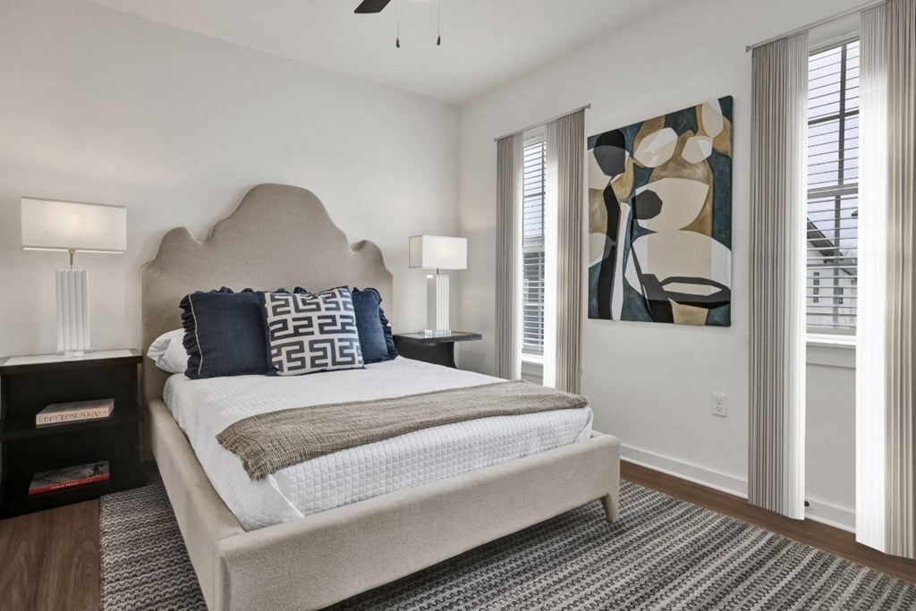 Bedroom with ceiling fan at West Row Townhomes and at West Row Townhomes at West Row Lofts and Townhomes in Birmingham, AL